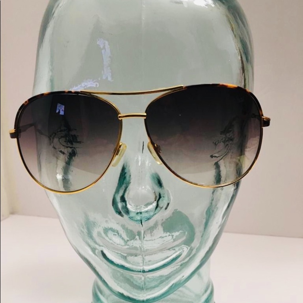 AX Armani Exchange light Gold & Dark Brown.